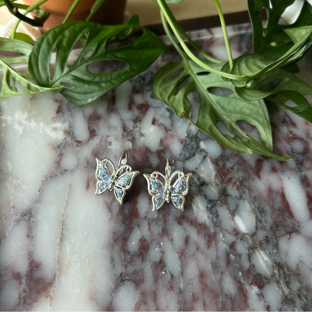 Elegant Vintage Silver butterfly clip on earrings with blue sparkles